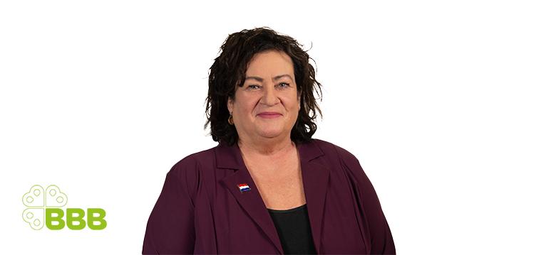 Portrait of van der Plas with logo BBB.