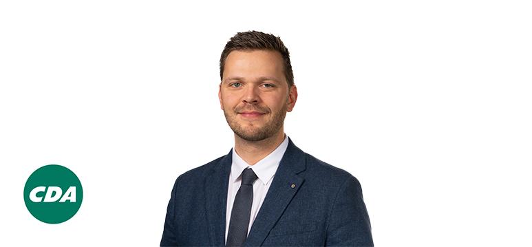 Portrait of Krul with logo CDA.