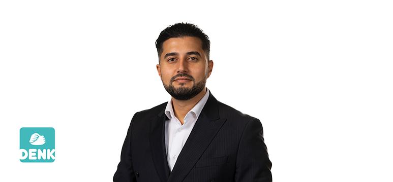 Portrait of Ergin with logo DENK.