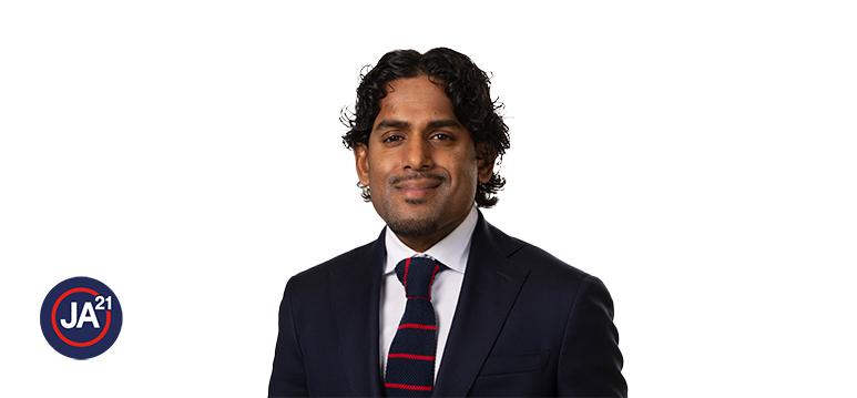 Portrait of Clemminck with logo JA21.