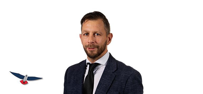 Portrait of Boon with logo PVV.