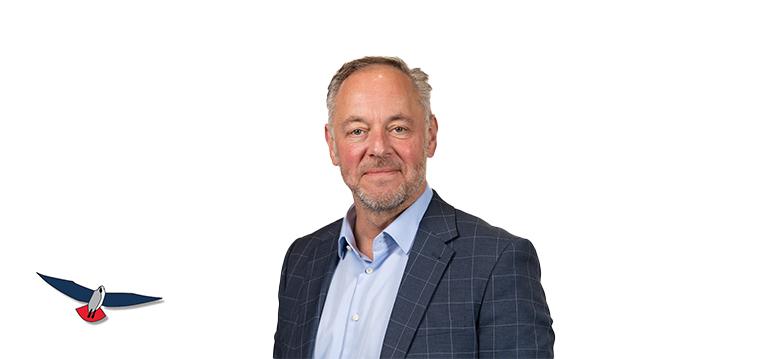 Portrait of Prickaertz with logo PVV.