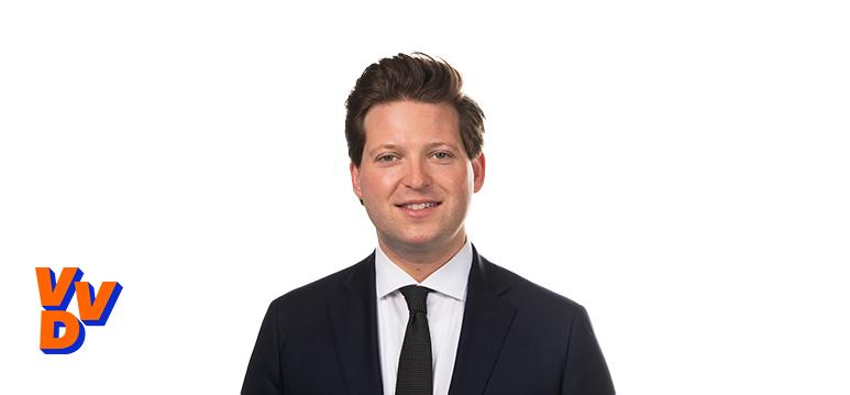 Portrait of van Campen with logo VVD.