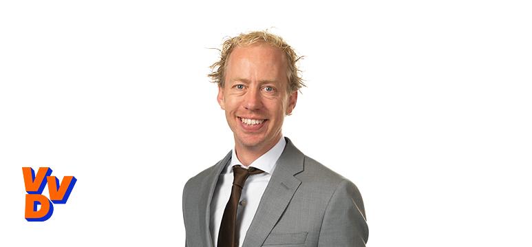 Portrait of Kisteman with logo VVD.