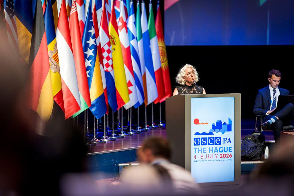 Farah Karimi on stage in World Forum.