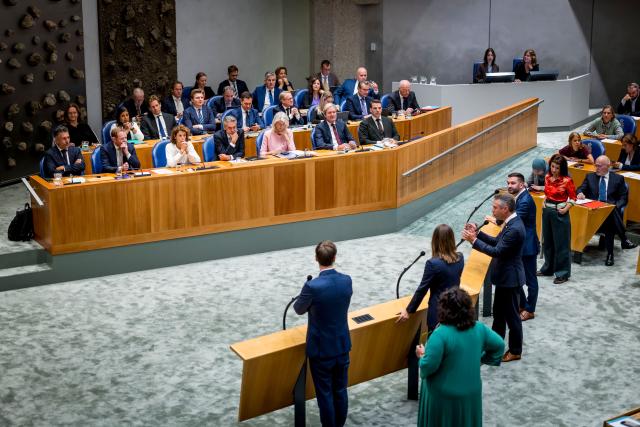 Members of Parliament in debate, in the plenary hall