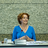 Mrs. Kathalijne Buitenweg as she presents the report to the President of the House